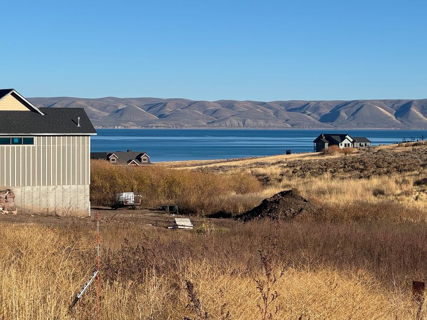 Discover the perfect place to build your dream home in The Reserve at Bear Lake, one of the area's most desirable gated communities. This beautiful, fully improved lot features paved roads with power, water, and sewer already stubbed to the property, making it ready for construction. Enjoy direct access to Fish Haven Canyon, offering year-round recreation with miles of trails for hiking, mountain biking, snowshoeing, snowmobiling, and ATV/UTV riding. Ownership in The Reserve includes use of outstanding amenities such as a clubhouse with a fitness room, two heated seasonal pools, a year-round hot tub, splash pad, covered pavilion, basketball, tennis, and pickleball courts, a playground, and gated beach access to the crystal-clear waters of Bear Lake. This homesite combines convenience, recreation, and luxury-an ideal setting for your Bear Lake retreat.