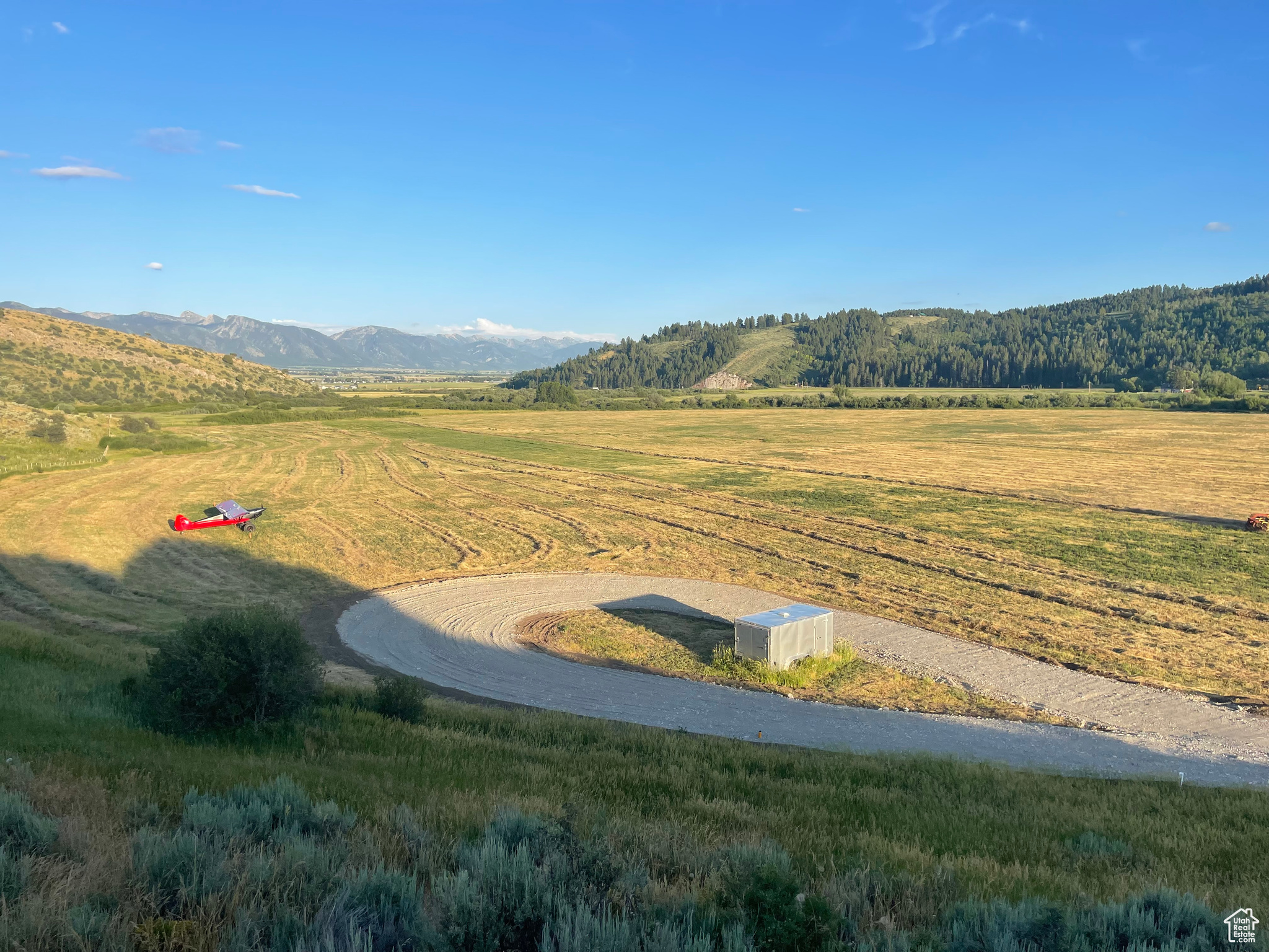 Spectacular Star valley acreage with nearly 300 feet of Tin Cup Creek frontage, a leveled 2,000'X75' grass runway, and improved graveled road access. Private, quiet, and secluded, but located only 10 minutes to town services. Irrigation water rights and great pasture. May be possible to divide twice. Call listing agent for more information.