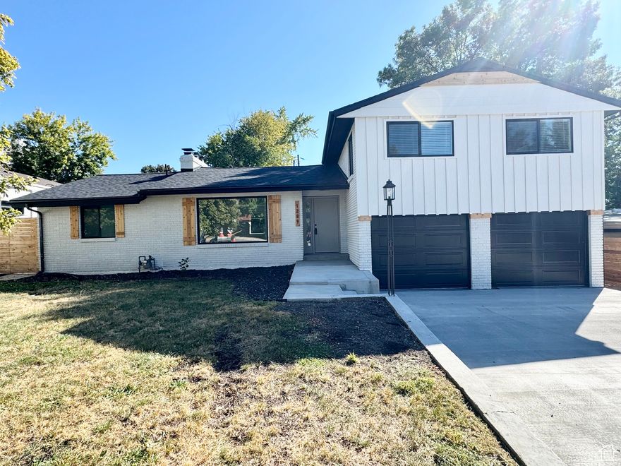This beautifully remodeled East Bench home is ready to impress. One of its standout features is the fully separated ADU in the basement - complete with its own entrance, laundry, full kitchen, family room, and bathroom. Perfect for guests, extended family, or as a rental opportunity to help offset your mortgage. Use a portion of the ADU rental income to qualify to purchase the home. This home has been thoughtfully updated from top to bottom, nearly every major system has been addressed: brand-new roof and rain gutters, new driveway, on-demand water heater, two new furnaces with all-new ductwork, a new A/C unit, updated plumbing with new interior sewer lines and pex lines, new electrical (in most of the home), and new cedar fence and shutters. Inside, you'll find fresh LVP flooring, new carpet, and paint inside and out. Additional upgrades include new garage doors and openers, updated molding and doors, and two fully remodeled kitchens with new cabinetry, quartz countertops, and stainless-steel appliances - including refrigerators on both levels. The main level offers a luxurious primary suite with vaulted ceilings, a soaking tub, walk-in shower, and double walk-in closets. Upstairs, three additional bedrooms and a full bath provide plenty of space for family or guests. With nearly every inch of this home updated, it's truly move-in ready. Come see it for yourself - schedule your showing today!