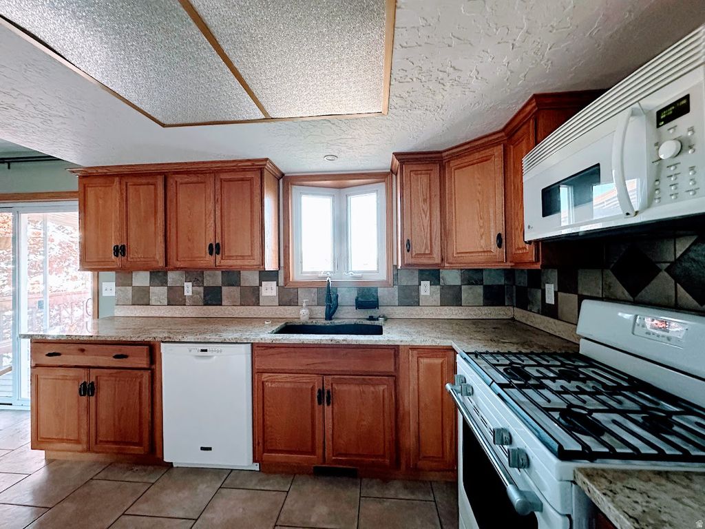 Photo of 1185 W 725 N, Clearfield, UT 84015 (MLS # 2156533)