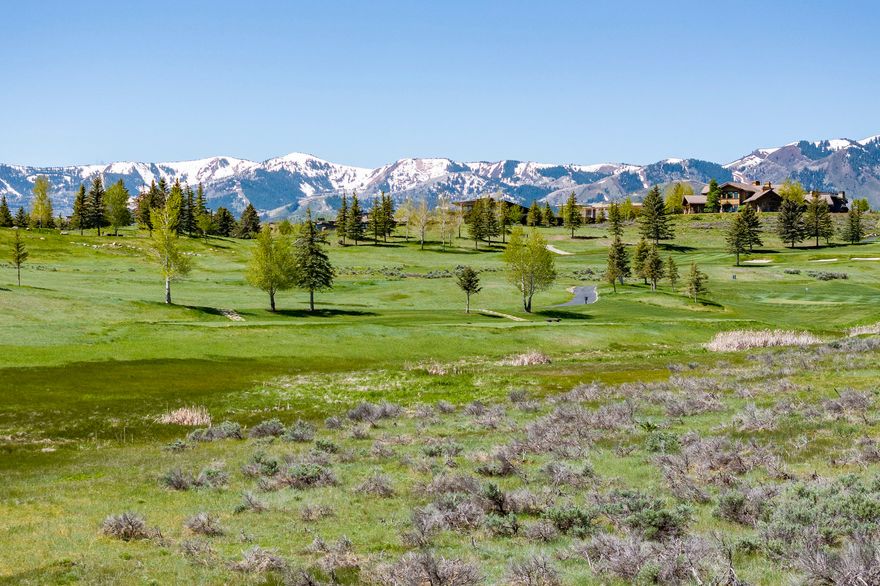 Welcome to 8175 Glenwild Drive-an exceptional opportunity to build your dream mountain home in Park City's most exclusive gated golf course community. This nearly one-acre, flat homesite is one of the last remaining parcels in Glenwild, a private enclave of under 200 lots and 85% built out-making land this special exceedingly rare. Positioned directly on the 4th green of Utah's #1 rated golf course (Golf Digest, Tom Fazio design), this lot boasts panoramic, south-facing views of the ski resorts and lush fairways. With open space on three sides-south, east, and north-you'll enjoy unrivaled privacy, natural light, and breathtaking scenery from every angle. Whether you envision a modern mountain retreat or a timeless lodge, the flat terrain makes for an effortless build, and Glenwild's flexible architectural guidelines support a range of design styles. Just inside the back gate, this parcel offers quick access to the community's award-winning amenities that can be accessed by purchasing a separate golf or social membership: an elegant clubhouse, fine dining, bar, fitness center, year-round heated pool and spa, tennis and pickleball courts, Nordic skiing, and a full-service spa. Outdoor lovers will appreciate the trailhead across the street, connecting to Park City's 500+ miles of trails, and wildlife watchers will frequently spot elk, moose, deer, and hawks passing by. Glenwild's unmatched convenience-only 30 minutes from Salt Lake International Airport and minutes from Whole Foods, restaurants, shopping, and ski resorts-makes it ideal for full-time living or a luxurious second home. No club membership is required to own, but golf and social memberships are available separately. Don't miss this chance to create your custom sanctuary in a true four-season paradise with all the comforts of a tight-knit, secure community.