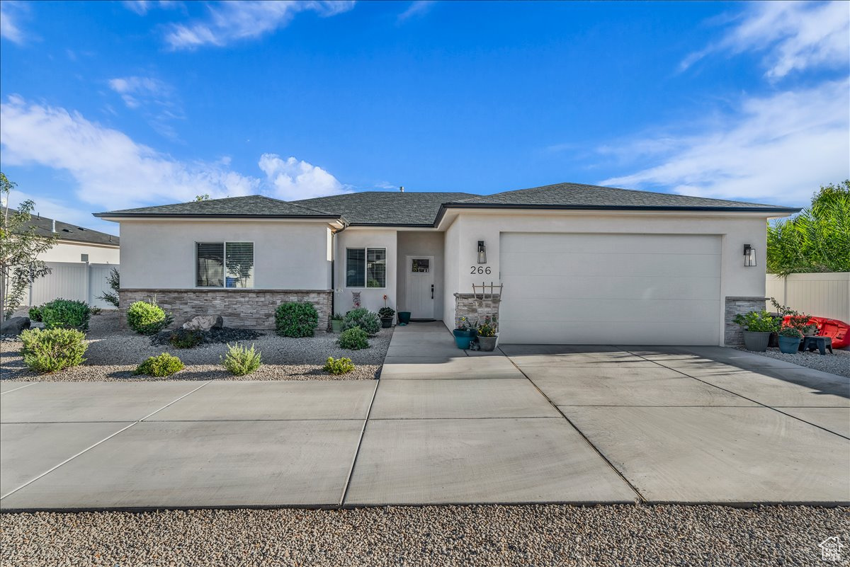 Welcome to modern living in this inviting 3 bedroom/2 bathroom home. The open concept design seamlessly connects the living room and kitchen. Elevated by 9 ft ceilings, the interior feels spacious and bright while finishes include granite countertops throughout, LVP flooring, custom cabinetry and light fixtures. Outside the fully fenced and landscaped backyard offers privacy and perfect place to relax or gather.