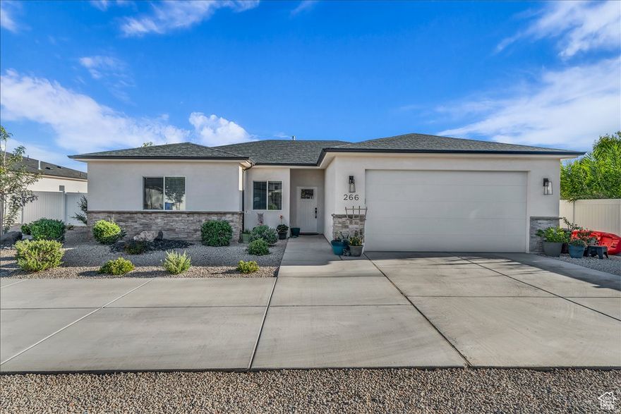 Welcome to modern living in this inviting 3 bedroom/2 bathroom home. The open concept design seamlessly connects the living room and kitchen. Elevated by 9 ft ceilings, the interior feels spacious and bright while finishes include granite countertops throughout, LVP flooring, custom cabinetry and light fixtures. Outside the fully fenced and landscaped backyard offers privacy and perfect place to relax or gather.