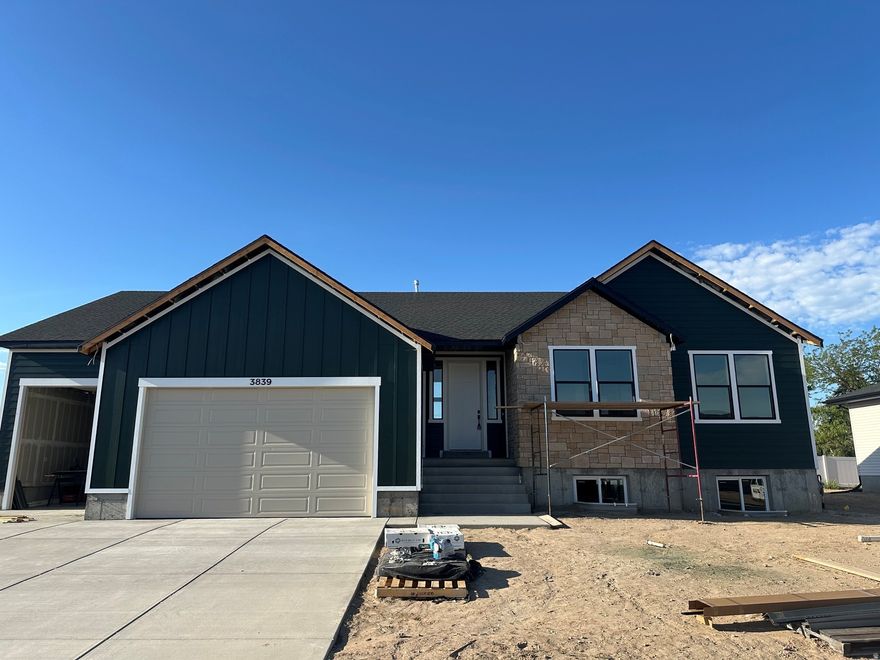 Live just minutes away from the new freeway and shopping. Open floor plan with the kitchen, dining and great room flowing together so the family time never stops. Kitchen includes upgraded quartz countertops with large island and a large pantry. Upgraded LPV flooring and carpet are a few of the upgrades in this home. Master bedroom includes walk-in closet, double sinks, large shower and corner bathtub. Home has a cover 12'x16' deck plus 3-car garage. Basement has potential of 3 bedrooms and full bath with large great room. If this home isn't for you, J Thomas Homes has more lots and can build the home of your dreams. Seller will contribute $10,000.00 towards closing costs, using one of our preferred lenders.