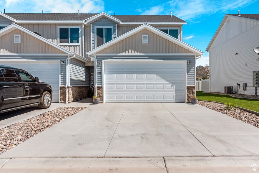 **Bright & Spacious End-Unit 3 Bed, 2.5 Bath Townhome in a Charming Small Town**  Welcome to this beautifully maintained end-unit townhome featuring 3 bedrooms, 2.5 bathrooms, and an ideal layout for both comfort and functionality-all nestled in the heart of a peaceful small town.  The main floor offers an open-concept living and dining area filled with natural light. The kitchen is well-equipped with plenty of cabinet space and flows effortlessly into the dining area, making entertaining a breeze. A convenient half bath on the main floor adds extra practicality for guests and everyday living.  Upstairs, you'll find three spacious bedrooms, including a serene primary suite with a full private bath and ample closet space. Two additional bedrooms share a second full bathroom-perfect for family, guests, or a home office setup.  Enjoy your own outdoor space, ideal for morning coffee or evening BBQs, and take advantage of the low-maintenance lifestyle this townhome offers. With attached parking, in-unit laundry, and a welcoming, well-kept community, this home is move-in ready.  Located just minutes from local shops, parks, and schools, you'll love the charm and convenience of small-town living.  **Don't miss out-schedule your private showing today!**