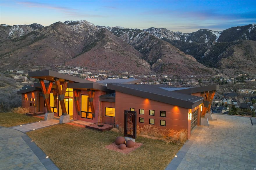 The most majestic view in SL County.  Striking architecture in 24/7 gated/guarded Pepperwood. Five bedrooms, seven bathrooms, two great rooms, exceptionally large kitchen, butler's pantry, wine room (or sixth bedroom), two laundry rooms, indoor basketball/pickle ball court, splash pad for the kids.  10,100 SF on two levels, 1,000 SF upper deck, 1,000 SF lower level patio, fire pit, hot tub, next to a huge manicured back yard. All main level living for the owner. Giant, six car garage.  A five minute stroll to Pepperwood's Pavilion; offering a social/dining rotunda, picturesque walking  park, dog park, children's playground, basketball, volleyball, pickleball, heated/life guarded pool with diving boards/swimming lanes.