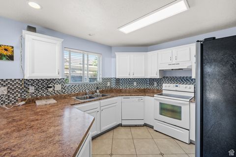 Tiny photo for 3821 S KINGSBURY LN W #B2, West Valley City, UT 84119 (MLS # 2100552)