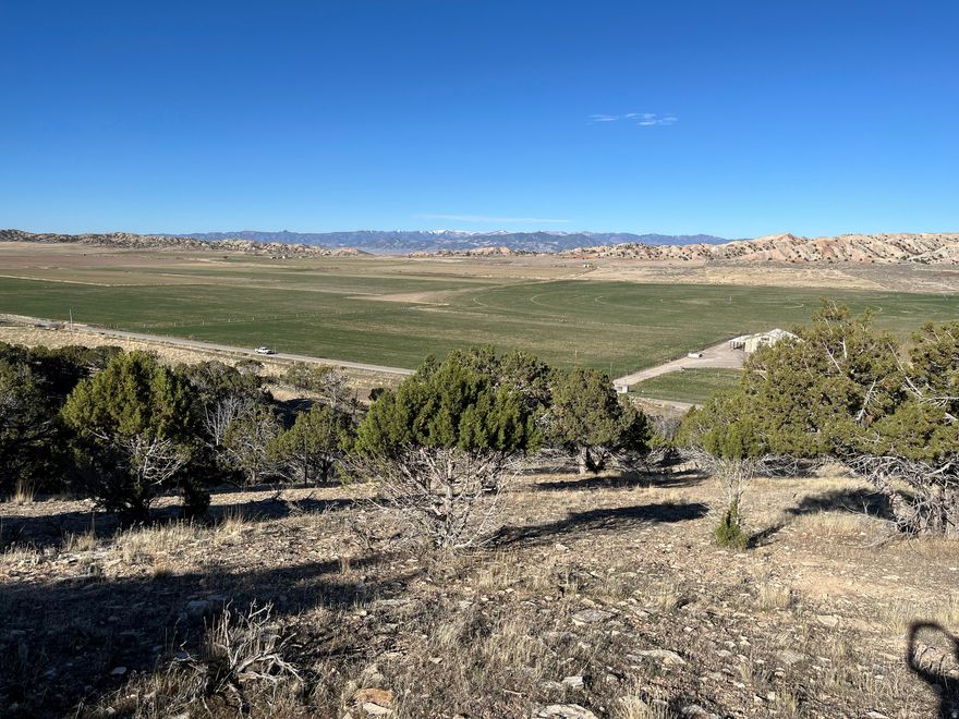 3.8-Acre Dream Lot in Southfield Heights Subdivision with Panoramic Mountain Views & Well Drilled  Near Manti-La Sal National Forest  Escape to peaceful country living under wide-open skies and crisp fresh air on this rare, developed building lot. Culinary water is stubbed directly from an extra-deep, newly drilled shared well, complete with 1 acre-foot water right, making this deep 3.8-acre parcel an outstanding opportunity to build your custom home with minimal upfront utility work.  Choose your ideal setting: build close to the front for easy access or tuck your home farther back for ultimate privacy and seclusion. Enjoy breathtaking panoramic views of rolling countryside framed by spectacular mountain ranges, with unforgettable sunsets painting the horizon each evening.  Just minutes from the entrance to 12 Mile Canyon and the Manti-La Sal National Forest, endless recreation awaits - world-class off-roading, hiking, camping, fishing, backpacking, and more. Conveniently close to grocery stores, gas, golfing, excellent schools, and a charming town park, this lot perfectly balances serene rural retreat with everyday amenities.  Whether you're seeking a full-time family home, a peaceful part-time escape, or a private getaway, this versatile canvas offers endless possibilities. Septic system required; perc test has already been completed for buyer confidence. Power is available at the road.  Agent is related to the seller. Acreage is per county records for convenience; buyer to verify. Recent survey available upon request. Additional adjacent acreage also for sale.  Come experience the serenity and imagine the lifestyle this beautiful land can provide. Don't miss your chance to build the home of your dreams in this idyllic setting.