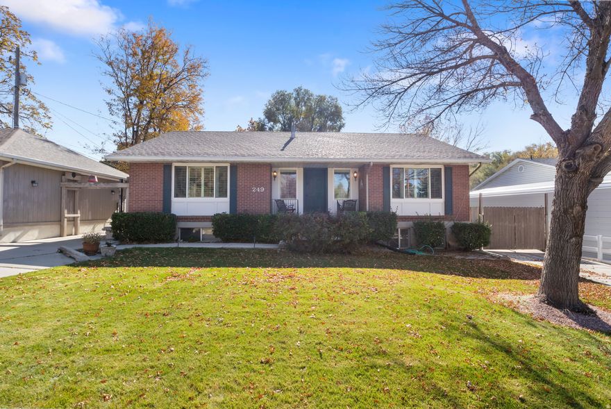 ***OPEN HOUSE***SAT 12/6****11 am - 2 pm**** Charming All-Brick Rambler in the Heart of Springville  just a short walk to historic downtown and close to I-15. This beautifully maintained all-brick rambler blends comfort, creativity, and convenience. The homeowners thoughtfully crafted an inviting, private outdoor retreat with mature trees,  covered patios, and quiet garden nooks perfect for entertaining and relaxing.  Inside, natural light pours through plantation shutters, highlighting updated laminate flooring and carpet. The spacious open great room is ideal for gatherings, and a large rear addition offers incredible flexibility, currently used as a primary bedroom complete with a custom closet system. Currently configured with a 1-bedroom apartment featuring its own exterior entrance, this home offers options for multigenerational living, rental income, or easy conversion back to the main home. This home features an 1100 sq. ft.  studio/shop. A large 2-car garage and additional parking ensure space for vehicles, gear, and guests. A rare opportunity to own a truly unique and well-loved property in a fantastic location. Schedule your showing and experience the space, light, and serenity this home provides.