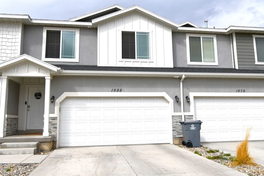 Beautifully maintained townhome in quiet area of Mapleton.  Quartz Tops, upgraded white cabinets with crown molding, tile & wood flooring, central air, 2 tone paint.  Unfinished basement provides room for growth and lots of storage. 2 car garage, High quality exterior products. Tenants are very tidy. They are on a month to month contract, and can easily move, but are also willing to stay. See agent remarks and exclusion remarks.