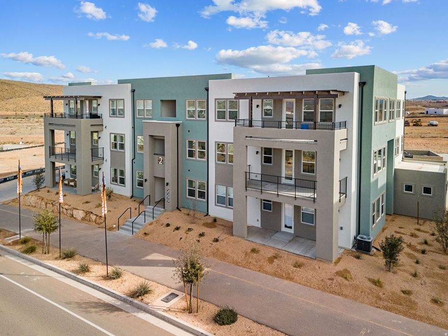 Brand New  Holmes Homes condo in the incredible Desert Color community , This is a 2 bed 2 bath 1 car garage  condo with Beautiful  finishes , Stainless steel appliances , Quartz countertops throughout . 9 ft ceilings  Main level living . 9 condo on the top floor ) No elevators .  This condo is eligible for the$20,000 Utah first time homebuyer program . Ask about our preferred lender incentives 4.99% fixed on a 2/1 buydown .