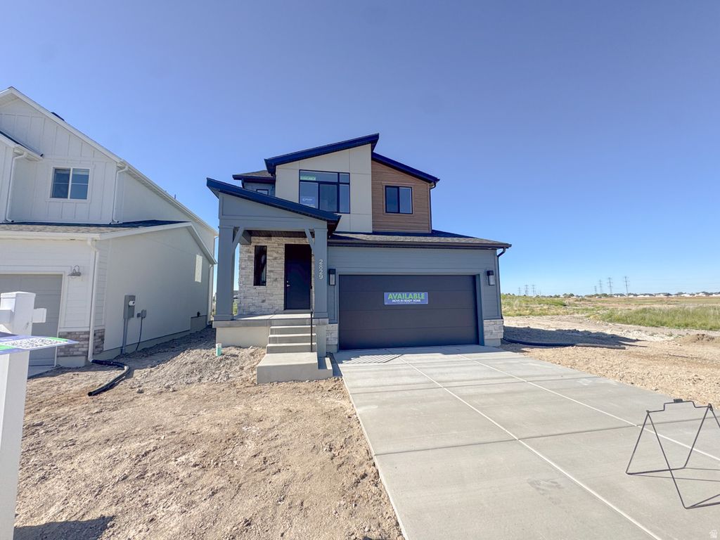 Photo of 2829 W GUERNSEY LN #218, Plain City, UT 84404 (MLS # 2162808)