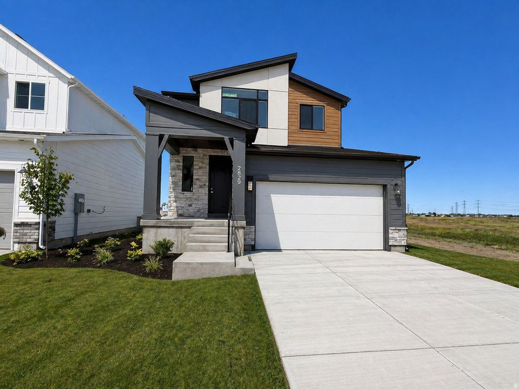 Photo of 2829 W GUERNSEY LN #218, Plain City, UT 84404 (MLS # 2162808)
