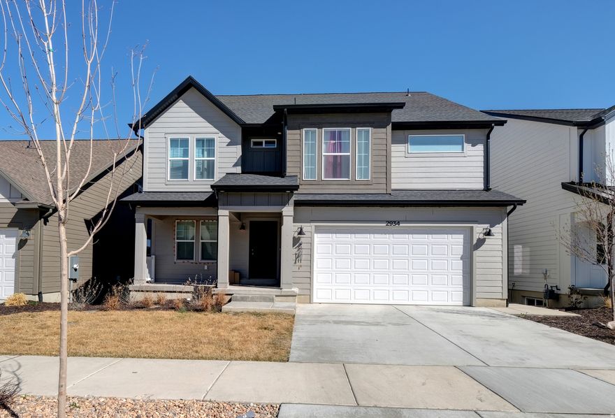 Better than new construction! This spacious 6-bedroom, 3.5-bath home offers the upgrades, space, and functionality you don't get with a base build. Featuring a 100% finished walkout basement with a separate entrance, including a 2-bedroom living space with kitchen currently generating approximately $1,600/month, providing immediate income potential to offset your monthly costs. Why wait months to build and spend more to finish a basement when this home is move-in ready today? Located in the highly desirable Wildflower community with access to parks, trails, clubhouse, pool, pickleball courts, playgrounds, gathering areas, and a private community lake.