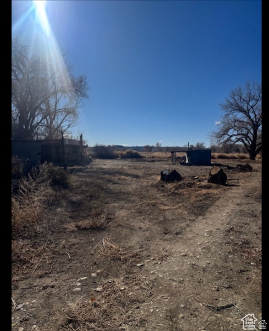 Great private property with endless opportunity. This lot is zone commercial, with easy access. Water is connected to the property. Green River's proximity to outdoor recreation hotspots like San Rafael Swell, Arches National Park, and the Canyonlands ensures a steady flow of visitors, making it a prime location. The property benefits from the area's small-town charm and the growing demand for services in this scenic getaway community.