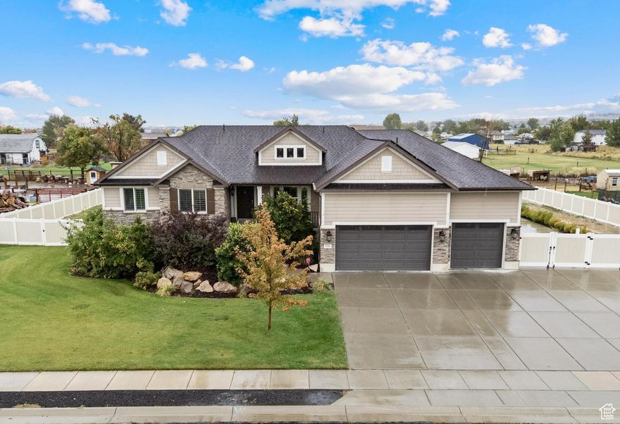 SELLER IS OFFERING $8,000 toward CLOSING COSTS when you use our preferred lender.     CUSTOM-BUILT home with SOLAR PANELS, BACKUP BATTERY SYSTEM, RV Parking, and NO HOA!!!    Sitting on a SPACIOUS 0.7-Acre Lot, this beauty offers 6 Bedrooms, 4 Bathrooms, an Oversized 3-Car Garage, plus multiple RV Pads and extra parking for all your cars and toys.    Enjoy the privacy of NO backyard neighbors looking directly in, and the freedom of NO HOA!!     The INCLUDED SOLAR PANELS help keep your electricity bill incredibly LOW (sellers pay around $15/month year-round), while the BACKUP BATTERY SYSTEM gives you peace of mind during power outages.    The huge family room downstairs can double as a THEATER or GAME ROOM, complete with a bonus KITCHENETTE -  perfect for family fun nights!    The DAYLIGHT WALKOUT BASEMENT also has a separate entrance, offering great flexibility.    Located in a quiet, family-friendly neighborhood, this gem has it all. Don't miss your chance to make it yours - COME SEE IT TODAY! Information and measurements are provided as a courtesy. Buyer is advised to verify all information.