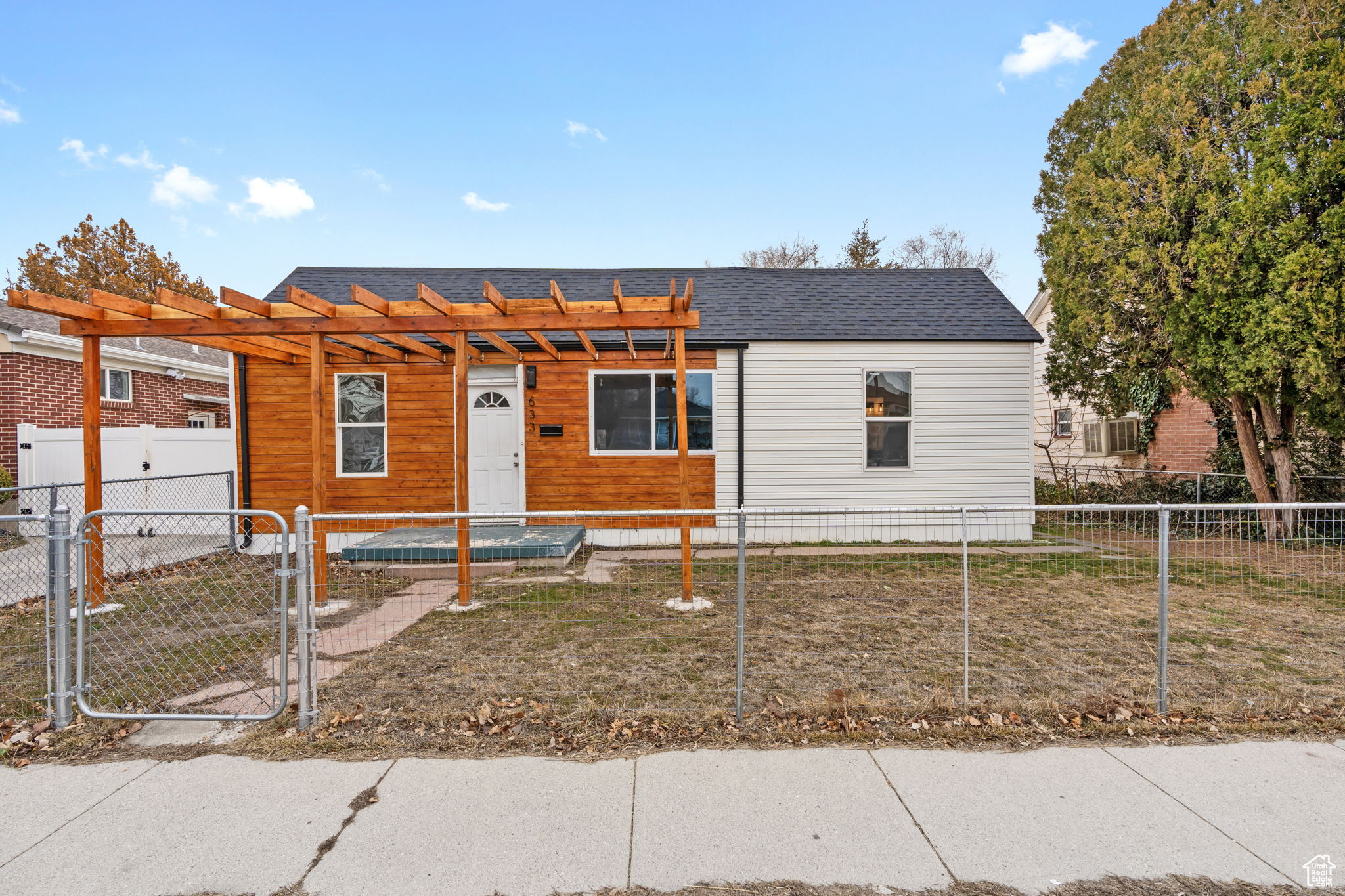 Nestled in a prime central location just minutes from downtown Salt Lake, this beautifully updated 4-bedroom, 2-bathroom home offers modern living with timeless charm. Featuring granite countertops, brand-new flooring, plush carpet, and a stylish farmhouse sink, every detail is thoughtfully designed for comfort and elegance. Enjoy a spacious backyard with ample parking for multiple vehicles and the convenience of a private alleyway for easy access. Plus, the city allows you to build a 1,000 sq. ft. ADU in the back, adding even more potential to this fantastic property. A must-see for anyone looking for a move-in-ready home!