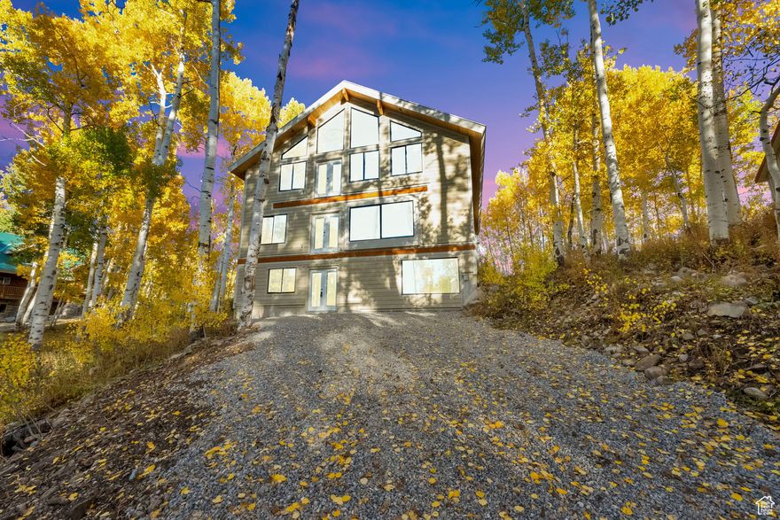 OPPORTUNITY AWAITS! Now is your chance to turn your dream of owning an incredible cabin in the woods into a reality! Nestled in the upper area of the beautiful gated community of Timber Lakes, this property is brimming with potential! This is your opportunity to pick up at the construction stage where someone else left off and bring your vision to life. With framing, siding and roofing complete, all that's missing is the right buyer to finish this amazing cabin project and unlock its endless possibilities. Gorgeous open floor plan with stunning windows! Choose your own interior finishes. If you've been dreaming of creating your own mountain retreat, this is the perfect opportunity to shape it into something truly special, and you can't beat the location. Wooded with towering aspen trees, the lot backs up to open space, offering spectacular mountain views, privacy and seclusion. Surrounded by natural beauty, incredible wildlife and year-round recreation, including world-class golf, skiing and direct access to some of Utah's BEST snowmobiling right out your own front door, Timber Lakes offers the ideal backdrop for your masterpiece!