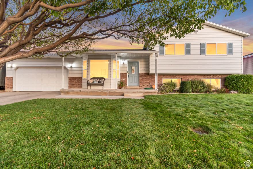 OPEN HOUSE this SATURDAY the 11th from 10-2pm!!! VIEW!!! VIEW!!! VIEW!!! Make sure to check out the View! This  wonderful home is nestled in a great neighborhood, offering easy access to shopping, freeways, and countless outdoor adventures. Step outside and enjoy your fully landscaped backyard with stunning views of the mountains and canyon. Relax on your covered porch under the shade of mature trees while you chat with friendly neighbors. This spacious home features 4 bedrooms, 2 full bathrooms, and is plumbed for a third bathroom in the basement, providing plenty of room for all your needs. The front room is highlighted by a beautiful bay window, adding charm and natural light. The home boasts numerous recent updates, making it feel brand new: Rare smoothed concrete in the crawl space for extra storage, Freshly painted doors with new hardware and door hinges, Brand new front door and frame, New garage (from garage into backyard) door and frame, Basement flooring installed less than a year ago, Carpet replaced in 2022, Energy-efficient new windows with warranty (2019), Gorgeous new quartz countertops in the kitchen (2024), Roof replaced in 2020, New 50-gallon water heater (2021), New HVAC and furnace (2018), new chandelier over kitchen table, new light in kitchen, new light/fan in living room, 6 new can lights in the basement family room, Hunter Douglas fans in upstairs bedrooms, Smart auto sprinklers updated in 2017, Transferable Vivint alarm system with sensors and keypad included. Professionally cleaned house and carpets shampooed  move-in ready! This home has been meticulously cared for and is ready for you to move in. Don't miss out on this fantastic opportunity to live in a highly sought-after neighborhood! Square footage is provided as a courtesy estimate only and was obtained by county records. Buyer is advised to obtain an independent measurement.