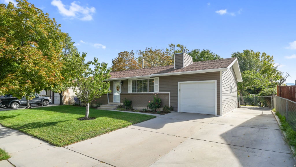 Photo of 5541 S WESTSIDE DR W, Salt Lake City, UT 84118 (MLS # 2185094)
