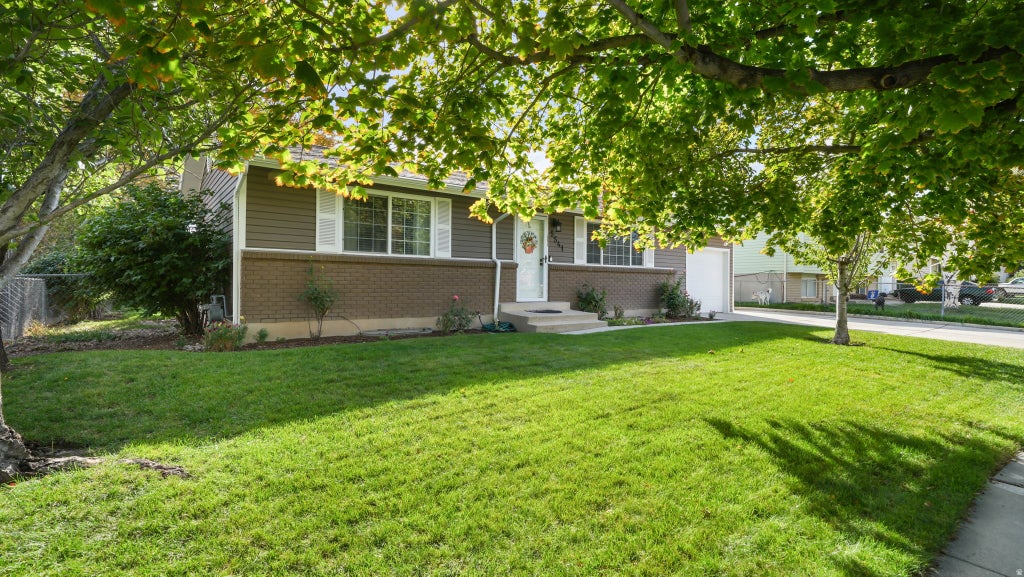 Photo of 5541 S WESTSIDE DR W, Salt Lake City, UT 84118 (MLS # 2185094)