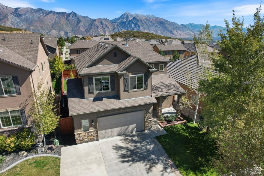 Impeccably maintained Suncrest home showcasing breathtaking views and thoughtful upgrades. The luxurious owner's suite features a spa-like bathtub, complemented by recent improvements including a new water softener, new water heater, polycuramine garage flooring, and new stove and microwave. A rare opportunity in Draper-exceptionally cared for and an outstanding value.