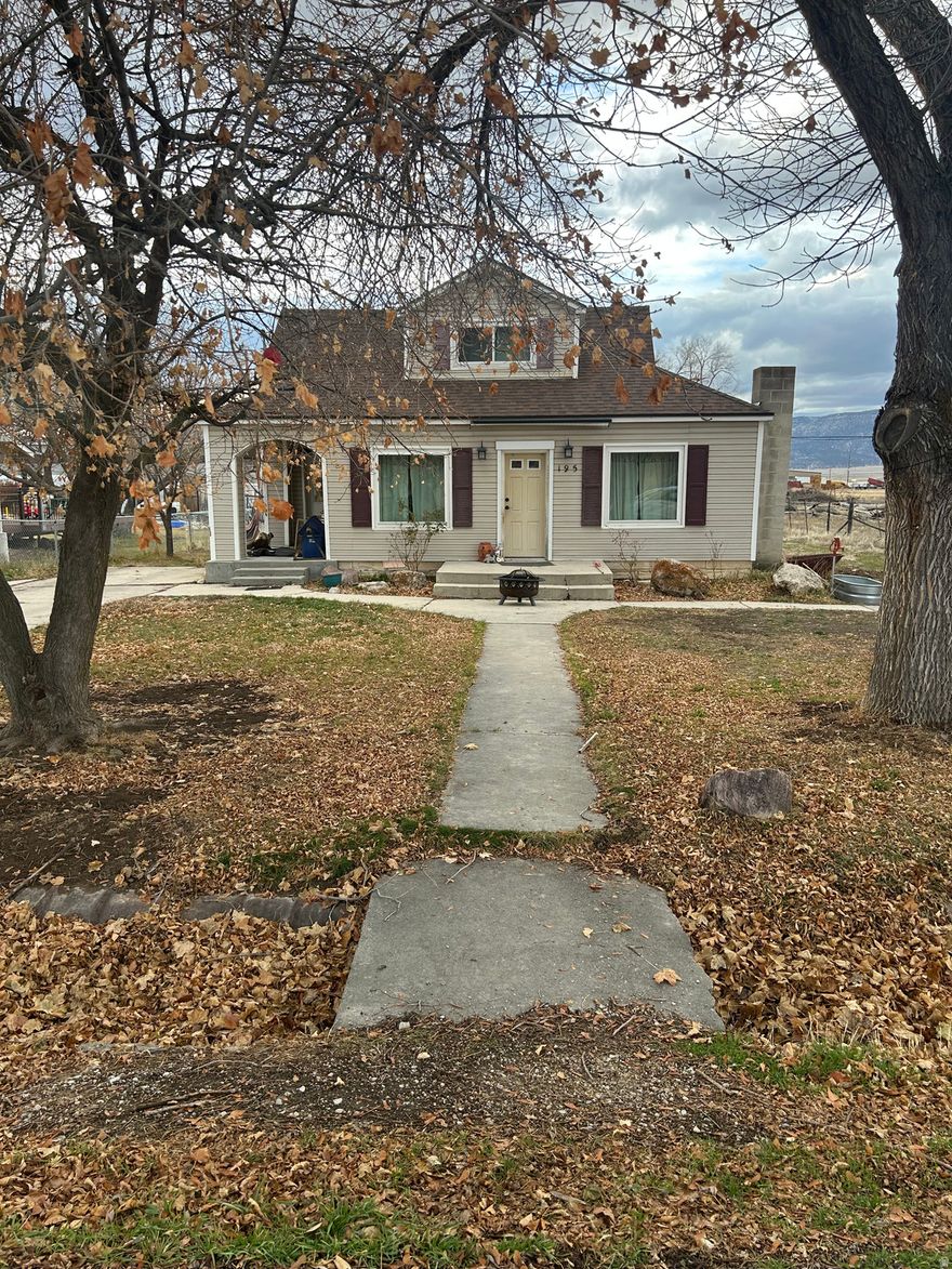 Cute, updated home. Quiet neighborhood. Big yard and animals are ok. Mature Trees, yard has raspberries, blackberries, and roses. Good sized outbuilding with shed attached that could be used for storage or workshop. Storage also in cellar. Kitchen updated with built in dishwasher, garbage disposal, Coriam countertops.  Close to shopping, snow College and Temple. 4 bedrooms, 1 bath. New tinted, double paned, shatterproof, energy efficient windows.  Windows include lifetime transferrable warranty . Good roof. Buyer and Buyers agent to verify all information.