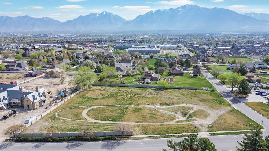 2.22-Acre Estate Lot for Sale in South Jordan, Utah.  Build Your Custom Home on this Rare 2.22-acre parcel in one of the Salt Lake Valley's most sought-after communities for custom home construction. Located on a quiet private lane off Gold Dust and Ingot Way, this oversized residential lot offers the space, setting, and freedom to design and build a truly exceptional estate home. Surrounded by mature trees and established custom homes, the property sits in an established neighborhood while offering the scale rarely found within city limits. No HOA restrictions mean full flexibility to build an estate-style residence with detached garages, a workshop, pool, outdoor entertaining areas, RV parking, and horse property accommodations - whatever your vision requires. South Jordan land of this size is exceptionally scarce. With top-rated Jordan School District schools, premier shopping, and everyday conveniences just minutes away, this lot delivers the lifestyle balance that luxury buyers are actively seeking: mountain views, open skies, quiet surroundings, and city access. Whether you're working with an architect on a custom floor plan or a builder ready to break ground, this is the canvas. Bring your plans and build without compromise. Property highlights: 2.22 acres | South Jordan, Utah | No HOA | Custom build opportunity| Close to South Jordan shopping, dining, and top-rated schools | Salt Lake County