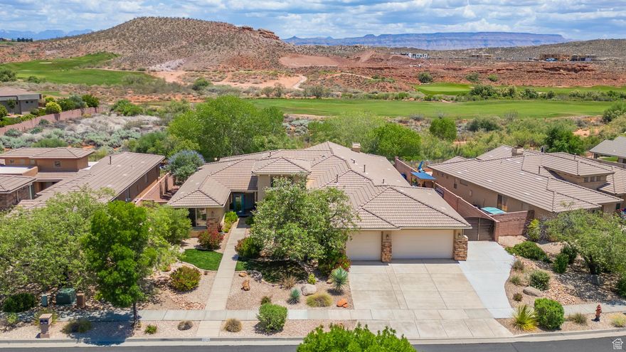 Views, Pool, Spa, Putting Green, Golf Couse Lot, Brand new flooring with wood floors throughout main areas, new carpet in bedrooms, new flooring in master bath. New paint, great family living space and lots of great guest room! Gated side of garage can accommodate low profile RV parking (nothing higher than gate). Mature landscape. Backyard is east facing to cool shaded afternoons and evening to enjoy the newer (2 years old) pool. Fun sleeping loft for extra space. A wonderful retreat in the highly regarded Coral Canyon Community with Golf, tennis, pickleball, over 10 miles of connecting trails, several parks and Canyon Club with fitness, pools, etc.