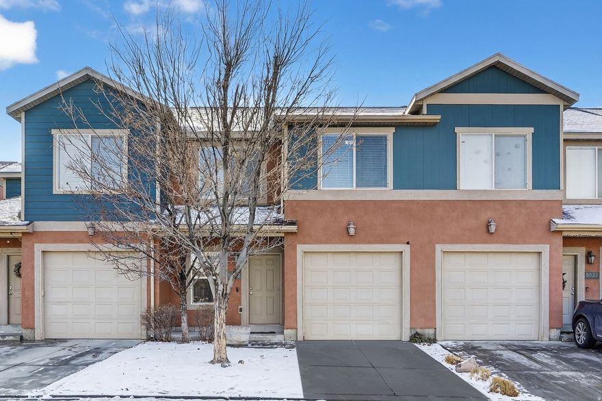 Immaculate, move-in ready townhome in a sought-after Herriman location.  This home shines with clear pride of ownership and thoughtful care throughout, offering a welcoming atmosphere and a layout that feels both comfortable and functional. The main level features a spacious family room, a bright kitchen with adjoining dining area, a convenient half bath, and new flooring throughout the main level. Just off the dining area, enjoy easy access to a covered back patio, perfect for everyday enjoyment or entertaining. Upstairs, you'll find three generously sized bedrooms, including a primary suite with a walk-in closet and private en-suite bathroom, along with a second full bath, upstairs laundry, new carpet throughout the upper level, and fresh paint throughout the entire home.  Additional highlights include a one-car garage with overhead storage, an included refrigerator, washer, and dryer, and a home that has been meticulously maintained and truly shows like new.  Located at the foothills of the Herriman Hills with easy access to Mountain View Corridor, the HOA offers excellent amenities, including a pool, clubhouse, park, and shared open space.
