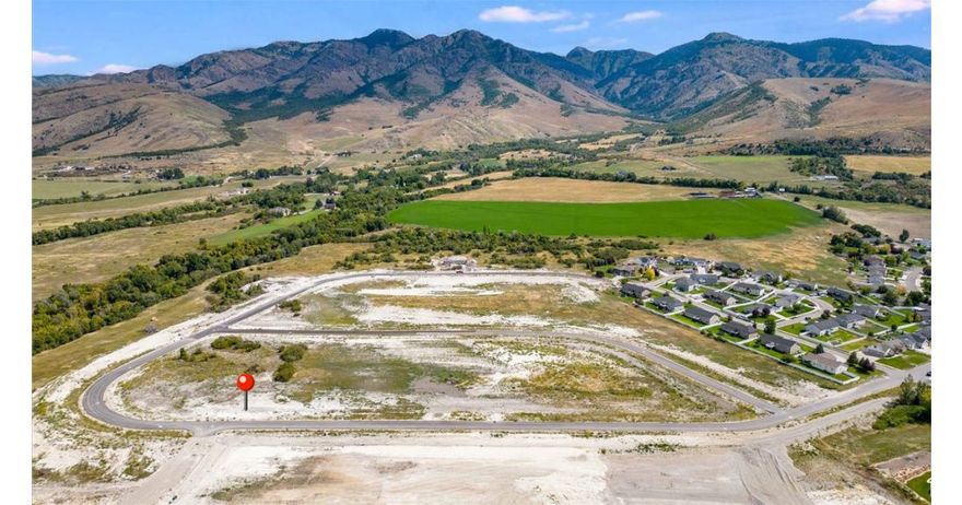 A spacious 0.51 acre west facing lot at the north end of Cache Valley, offering breathtaking sunset views over the valley . Nestled in the thriving Knolls community in Richmond, this property combines the peace of larger lots with access to locally owned business's and grocery stores. With the spring market right around the corner, now is the time to secure this premium lot before someone else does and builds their dream home!