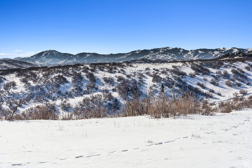 Discover the perfect blend of private natural mountain charm and easy access with this exceptional 20-acre parcel in Rockport Ranches. Sitting high atop the community with vast valley views and far reaching panoramic ski mountain peaks, this property offers approximately 5 flat, build-ready acres. This estate lot was the original developer's pick for personal ownership and is one of the rare lots in the area with year-round access via Rockport Estates. It also boasts close proximity to electricity making it an ideal site for your mountain retreat or year round home. Included with the property is a solar-powered tiny home, allowing you to immediately enjoy the land while exploring your 20 acres rich with wildlife and forever vistas. Horses permitted. Located only minutes from Rockport Reservoir, 30 minutes from Park City, 1 hour from the Salt Lake International Airport and less than 30 minutes from many outdoor recreational opportunities including skiing, lake and river fishing, hunting, water sports, hiking, mountain biking and much more. This property is a four-season playground waiting to be personalized.