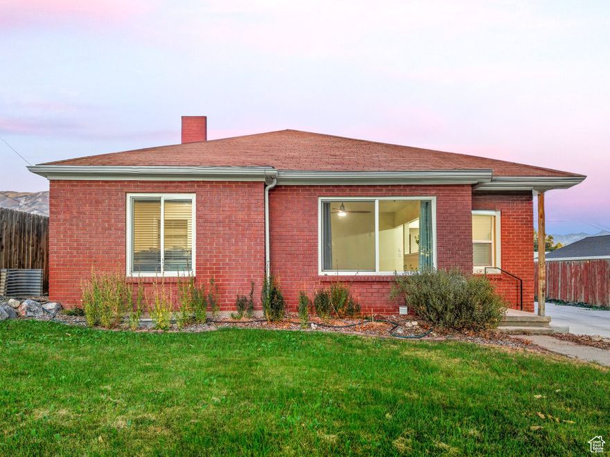 OPEN HOUSE SATURDAY NOVEMBER 22nd  10:30-12:30pm PRICE DROP -  This all-brick rambler in the heart of American Fork is the deal everyone's been waiting for. Homes like this don't hit the market often-especially with a RARE 2-bed, 2-bath main level and a full 2 bed / 1 bath mother-in-law apartment downstairs (with its own kitchen!). Perfect for extra income, multigenerational living, or hosting family without giving up your space.  Light-filled living areas, a charming dining nook, and thoughtful updates make this home feel warm and move-in ready.  Outside, enjoy a detached two-car garage, fully fenced yard, and a quiet established neighborhood just minutes from everything.  Homes with this much flexibility and charm do not last-especially at the NEW price. Don't wait-this one will go fast.