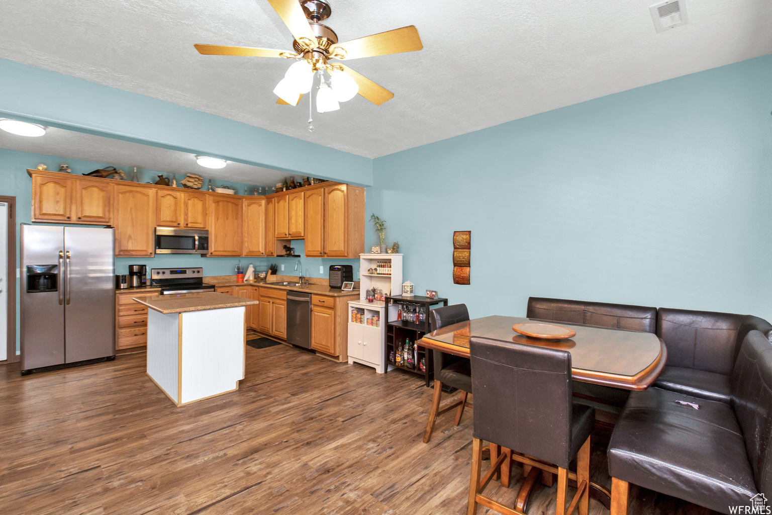 Check out this spacious 3 bedroom, 2.5 bath townhouse located conveniently next to food, freeway access and the fairgrounds! Featuring a bonus loft space that makes a great office or game room, an updated, open kitchen and a two car garage with a new motor and tons of storage, you won't want to miss out on this! Square footage figures are provided as a courtesy estimate only and were obtained from county records. Buyer is advised to obtain an independent measurement.