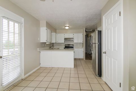 Tiny photo for 4888 W TICKLEGRASS RD S, West Jordan, UT 84081 (MLS # 2096301)