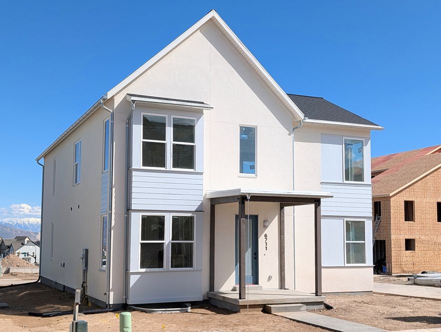 Brand new home with a FINISHED basement and beautiful designer upgrades throughout, including an upgraded gourmet kitchen with quartz countertops, upgraded cabinetry, 9-foot ceilings on all levels, fireplace, modern railings, and more. This popular Innovator floor plan features a spacious great room open to the dining area and kitchen, plus a main-level office, perfect for working from home. The primary suite offers a large walk-in closet and a spa-like en-suite bathroom with a separate stand-alone tub and shower. Situated on an alleyway corner lot, the home includes full landscaping, along with many additional features included. Estimated May 2026 Completion. Photos are of actual home under construction.