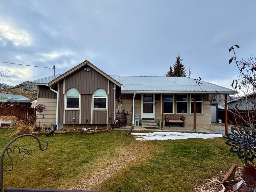 Located in Laketown, UT along the South shore of beautiful Bear Lake!  This Ranch style home has been updated with a newer furnace, A/C, Trim lighting, water heater/water softner, stainless appliances, freshly painted kitchen cabinets and luxery vinyl flooring.  The basement family room has an attached dry bar and is perfect for entertaining!  Enjoy pleasant evenings around the firepit or entertaining in the outdoor kitchen under the gazebo!   Fully landscaped yard with sprinklers, mature trees, patio and fenced in yard for privacy!  Includes two sheds and a greenhouse!  Minutes away from Rendezvous State Park for beach access and close access to the mountains for year round adventures!  Call for an appointment today!