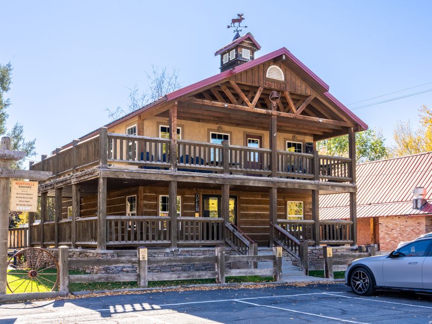 The Square is a rare mixed-use opportunity in the heart of Huntsville, Utah where Main Street visibility meets year-round mountain-town demand. Available as three distinct properties or as one complete transaction, this legacy package is zoned C-1, offering flexible use potential across multiple buildings and parcels-just minutes from the outdoor recreation Ogden Valley is known for, including Snowbasin, Pineview Reservoir, and endless hiking, biking, and alpine access. Gold Rush (MLS#2134564), zoned C-1, offers approximately 2,448 SF on 0.19 acres with flexible potential for retail, service, or mixed commercial use. This represents rare in-town commercial inventory with visibility and placement that's increasingly hard to replicate in Ogden Valley. Sold together, are the 1,456 SF commercial building, (MLS#2134567, currently leased to a long-term dental practice) 1,058 SF single-family home (MLS#2134566) featuring 2 beds and 1 bath on 0.02 acres, and the 966 SF event barn. All three share a large grassy common area adorned with charming sheds and small-town character-ideal for gatherings, weddings, and community events. If your dream is to own a restaurant in a Rockwell-esque setting, pinch yourself-you found it! The 1,836 SF restaurant (MLS#2134565) includes a turnkey equipment package with prep sinks, a 6' x 6' walk-in refrigerator, an ice cream freezer, stainless steel prep tables, a 6-burner range with oven, a 48-inch charbroiler grill, and more. In a town where recreation isn't a season-it's the infrastructure-this location is positioned to serve a constant rotation of locals, visitors, and outdoor crews. Together, with historic character, a walkable setting, and a multi-building layout, The Square in Huntsville, UT is positioned for entrepreneurs and investors seeking a flagship footprint in the heart of the Wasatch. As Snowbasin ramps toward the 2034 Olympics and Powder Mountain continues its evolution, now is the time to secure a true Main Street position in one of Northern Utah's most recreation-driven ski-town communities. *All property information, boundaries and documents to be verified by buyer.