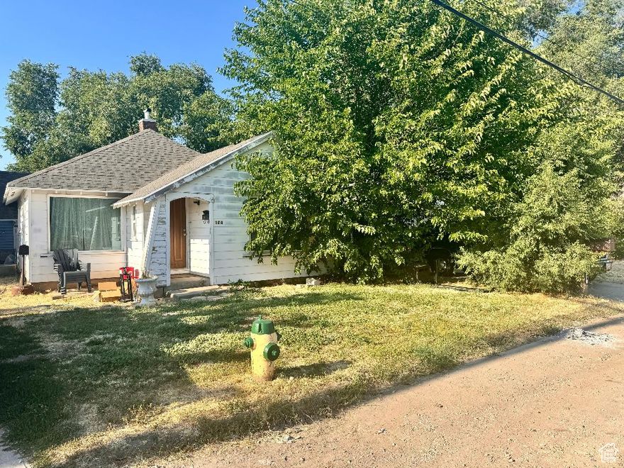 Two separate single family homes on one lot, with a non-conforming use certificate from Ogden city. Front home vacant to show and for an option to owner occupy. Previous tenant paid $2000 in front w/grg   rented 1 bay for $100. Back unit pays $1100 w/$100 pet deposit   per month and rents 1 bay grg for $100. Utilities paid by tenant w/agreement to pay Water/sewer/grbg. Fully occupied income is $3300 month, incl renting garage. Grg is 20 X 20.  Front home remodeled on main 4-5 yrs ago, kit updated w/counter/cabinets, flooring and paint. Bath update tile surround. Basement 796 sq ft, unfinished to add finished living space.   All appl incl. The second home in rear has 500 sq ft, 1 bedroom. Occupied, BEWARE OF DOG, DO NOT DISTURB. DO NOT SHOW.  Offer subject to inspection of rear home. Tenant personal property excl.   Lot is lush/green w/mature trees  on quiet street.