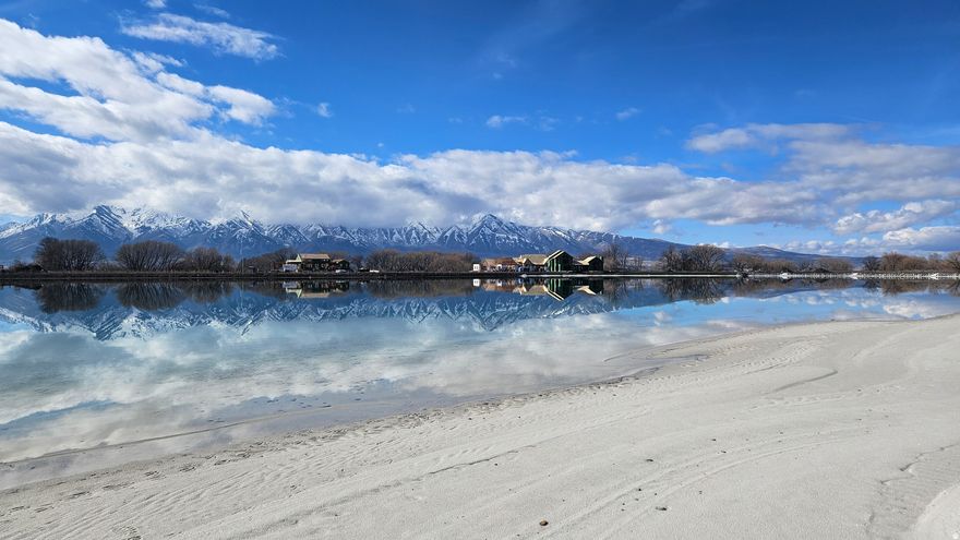 EXCLUSIVE LAKEFRONT LOT AT WILLOW LAKES! Utah's premiere outdoor lifestyle community, Willow Lakes is located in Cache Valley on the beautiful Logan River with 1.5 miles of private sandy beaches on two private lakes and over 2 miles of riverfront access. This prime lakefront lot on the Wake/Surf Lake has views of the Wellsville Mountains across the Logan River and the Bear River Range off your back patio! Both lakes are now full, the Clubhouse and Surf Simulator construction is expected in 2026/27.