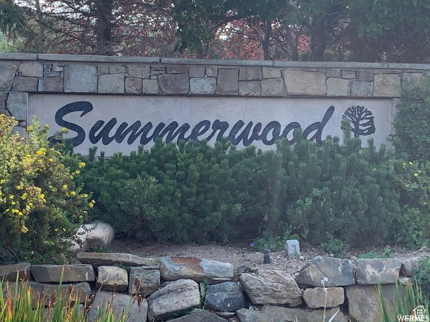 One of the few retaining lots in Summerwood. Surrounded by beautiful homes with close access to golf, hiking, mountain biking and parks. Enjoy the walkout basement and view from your back deck. HOA
