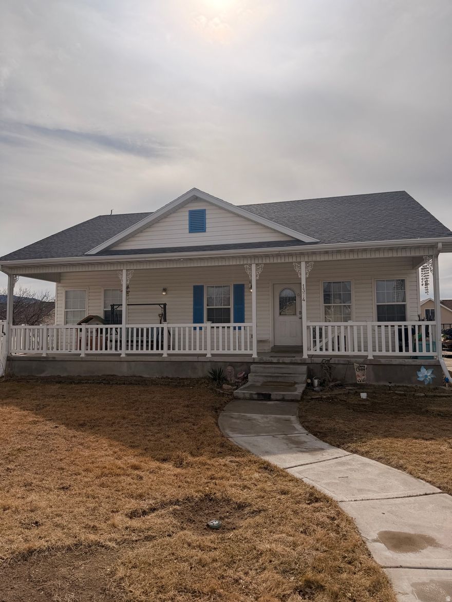 Motivated sellers. Willing to put 5k cash back towards finishing up the yard or upstairs floors.  The husband has been commuting to Ogden for work and they have decided to move closer. This did come a bit suddenly and they are still clearing things out. One of the biggest yards and only one this size under 600k .37 acres, a driveway that can fit multiple trailers/RV's and autos. They have been working hard on the yard but ran out of time to finish it up. They put a half court basketball court in, a huge in ground fire pit area, garden boxes, and has a separate little fenced in area for small children or pets. Also includes a wooden play set, in ground tramp and huge chicken coop (if you want chickens) and best of all, comes with the cutest 2 story play house they have been fixing up. It also includes hundreds of square feet of pavers and wall bricks. Huge front porch with a giant cold storage underneath. 3700 Sq ft with 7 bedrooms and a den/toy room. 3 full bathrooms.  Laundry room upstairs and downstairs and could easily set up the basement to add a kitchenette if you ever wanted to make it a rental. 3 bedrooms upstairs and 2 full bath, 4 bedrooms down with the toy room also downstairs and 1 full bathroom. Huge master bedroom. They have recently done the flooring in the entire basement and master and 70% recently painted. 2 water heaters, one is brand new and the other is a couple of years old. The windows, ac/furnace, and roof are the original but no known issues.