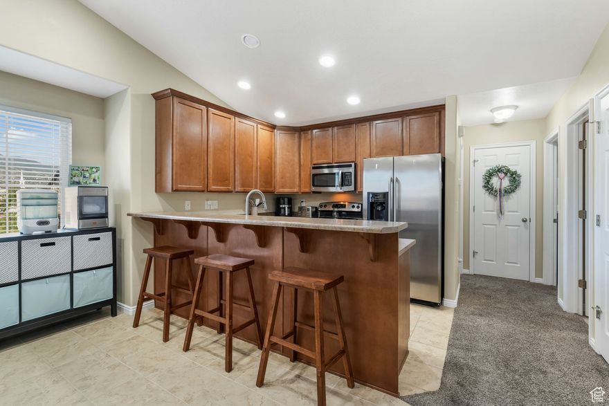 Welcome home to this bright and open 2-bedroom, 2-bath end unit  condo located in the highly desirable Foxboro North community. Step inside to an inviting open-concept layout that's perfect for cozy nights in, or hosting your favorite people. The kitchen flows right into the living space, making it feel extra connected, spacious and comfortable.  Living here means access to all the fun: 3 pools, a hot tub, full gym, basketball court, game room, trails, and playgrounds. Plus Legacy Park is just a stroll away with Food Truck Mondays and community events to bring everyone together. Bonus: you've got an extra assigned parking spot right out front, tons of guest parking and since it's a top-floor unit, that means no noisy upstairs neighbors!   Internet is included in the HOA, you're only 15 minutes to downtown Salt Lake City and just 10 minutes to the airport. Easy, breezy condo living with all the perks!