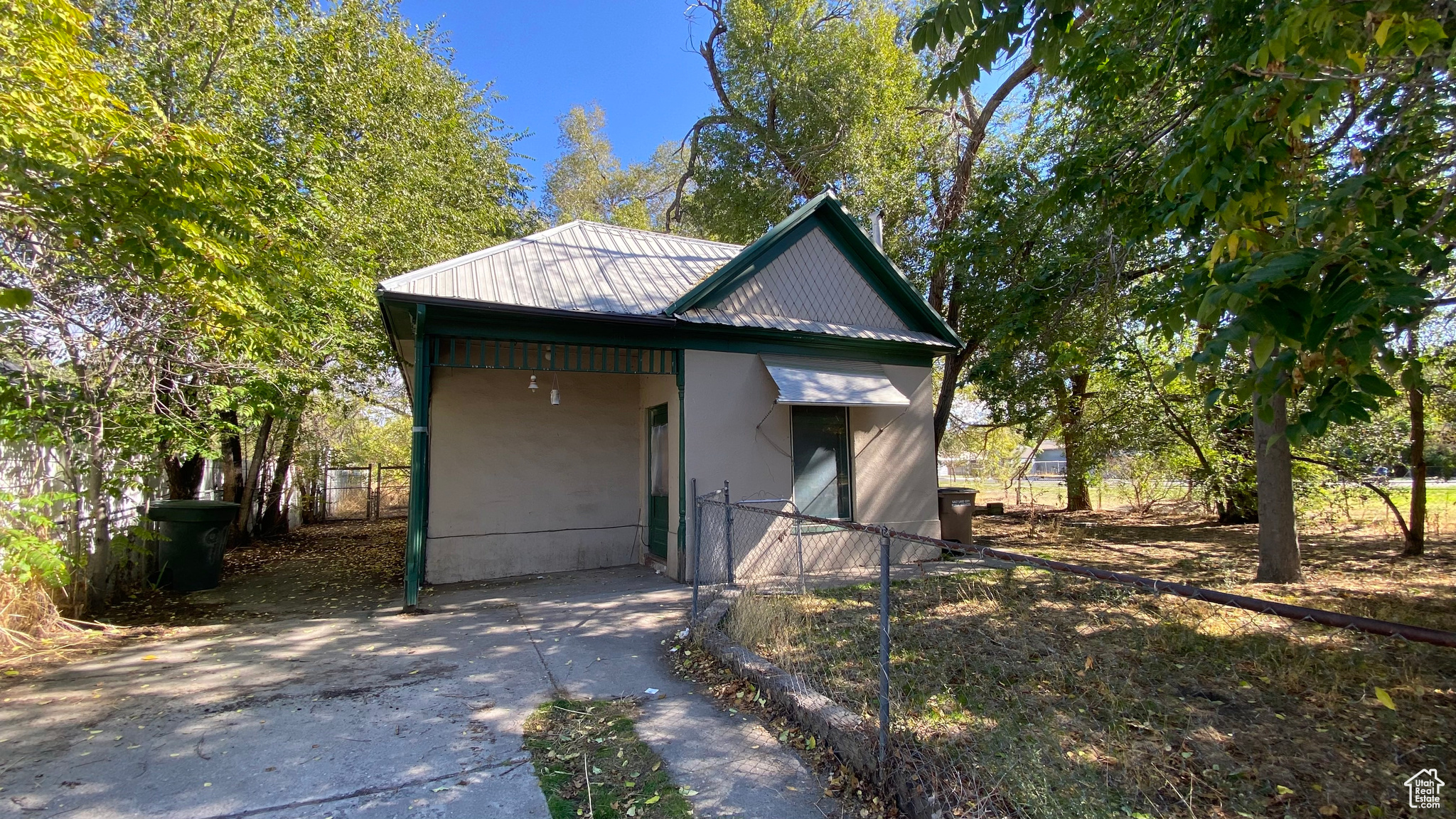 Investor Special Large Lot with Potential! Located on a generous 0.25-acre lot at the end of a quiet dead-end street, this property offers privacy and direct access to the city's walking trail system. Featuring laundry in the bathroom, a crawl space/cellar (no basement), and a newer furnace and water heater, the home has a solid foundation for your next project. The spacious backyard includes a shed and a manufactured mobile office, perfect for a workshop, storage, or home business setup. Ideal for investors, builders, or anyone looking for a renovation opportunity in a desirable area. Property sold AS-IS.