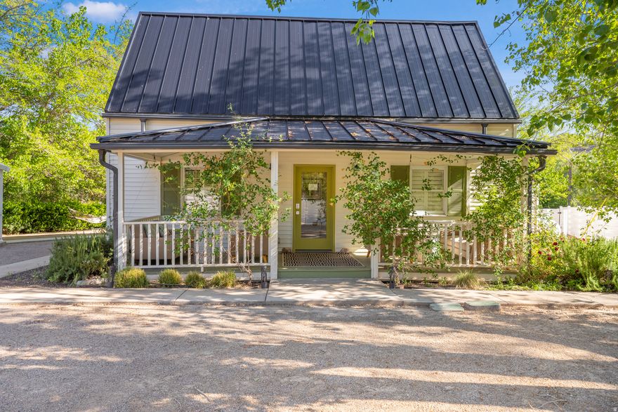 This beautifully updated property in the heart of Rockville represents a rare opportunity to own a fully licensed short-term rental just minutes from Zion National Park. Zoned residential but featuring a coveted transferable conditional use permit, the property is offered completely turn-key with all furnishings and the business included. The residence features a total of seven bedrooms, two full kitchens, and five-and-a-half bathrooms, all featuring elegant plantation shutters and modern updates. The layout is intelligently designed for maximum revenue, featuring four distinct rentable suites: 3 one-bedroom, one-bathroom units and a 4th suite offering two bedrooms and one bathroom. Complementing the guest spaces is a private owner's suite that includes the home's second full kitchen, bedrooms, and one-and-a-half bathrooms. This private wing also boasts its own separate entrance, dedicated parking, and a large basement with ample storage. Sitting on nearly half an acre, the exterior is a low-maintenance sanctuary designed for the ultimate guest experience. The grounds feature a charming gazebo, a dedicated cornhole area, a bbq grill and a cozy fire pit, all positioned to capture the spectacular red rock vistas. With a lot of this size, there is significant potential to tailor the property to your specific preferences and maximize appeal by adding high-demand amenities such as a swimming pool, hot tub, or pickleball court. This property offers the perfect balance of a private residence and a turnkey commercial venture in one of Southern Utah's most iconic locations.  Square footage figures are provided as a courtesy estimate only and were obtained from county records.  Buyer is advised to obtain an independent measurement.