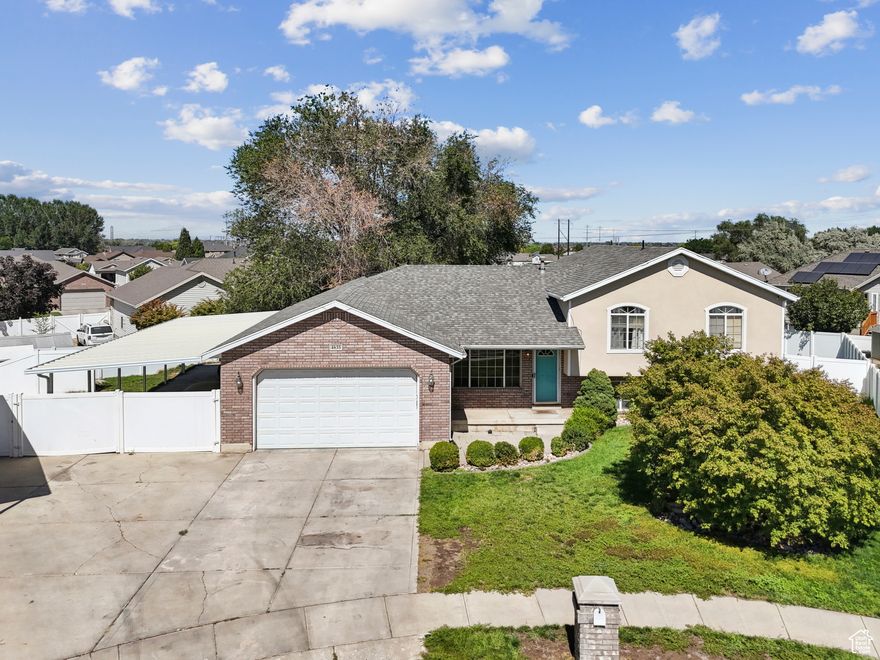 Come see this beautifully updated home with an open floor plan located in a nice quiet neighborhood at the end of a cul-de-sac. Beautiful remodeled kitchen with updated cabinets, granite counter tops, two car garage PLUS a spacious carport that fits 4 cars. Enjoy beautiful sunsets in the large backyard along with the covered patio.
