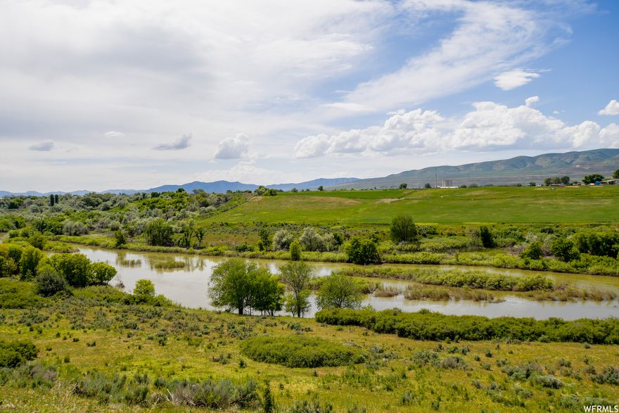 Beautiful river front property, Bear River on 3 sides. Dry farm NO irrigation water. Owners have (6) six 3/4 inch Residential culinary water connections to Garland City culinary water system. One connection may be used for stock watering. Not subject to impact fees provided buyer bears all costs to hookup. Access is from Deweyville side. Property has been surveyed. Buyer and Buyers agent to verify all information. Agent is related to Seller.