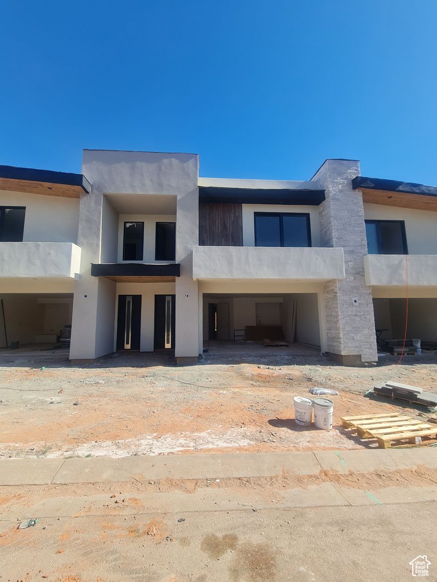 This is a luxury Town Home at Pecan Valley Resort. With access to Pecan Valley Resort's incredible 2 acre water park and clubhouse, with too many activities to mention here, you may never want to leave! This brand new unit will have a high quality, contemporary finish and an open layout that is perfect for entertaining or just having fun as a family. Located in the heart of Southern Utah's outdoor wonderland near Zions National park, with views of the world famous red cliffs of Southern Utah, and minutes away from popular Sand Hollow reservoir, it boasts an array of outdoor activities. Contact for availability and ask about our turn key option!