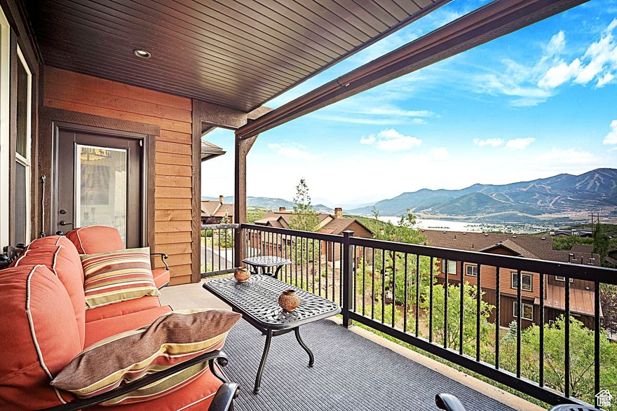 Discover the ultimate mountain lifestyle in this meticulously maintained, three-bedroom twinhome. Nestled on a quiet cul-de-sac in one of Hideout's most sought-after neighborhoods, this home offers a unique opportunity to enjoy rare, unobstructed views of Jordanelle Reservoir, Mount Timpanogos, Deer Valley ski runs, Hideout Reflection Pond, and the scenic nine-hole golf course. Your views remain undisturbed. The residence is thoughtfully designed with two separate living areas to accommodate family needs and provide ample space for relaxation. The kitchen features premium appliances, ample counter space, and a spacious pantry, making it ideal for cooking and entertaining. The main floor has a vaulted great room with a fireplace, breakfast nook, and deck access, seamlessly connected to the kitchen. The Primary suite is complete with a walk-in closet and ensuite bath, offering privacy and wonderful vistas. Of course, there is also a mudroom, a half bath, and a laundry room.  High-speed fiber internet supports seamless connectivity. The lower level comprises of two large bedrooms, a full bathroom, a comfortable family room, storage, and access to a large deck with a Hot Tub. Additional amenities include an extra-long driveway and a spacious two-car garage for vehicles and equipment. Mechanical upgrades include a new air conditioning system (installed July 2025), a soft water system (installed October 2024), and a whole-house humidifier. Conveniently located near Park City's premier skiing facilities and recreational opportunities at Jordanelle Reservoir, this property provides an ideal setting for both leisure and outdoor activities.  Snow Removal including Driveways, Exterior Maintenance, Staining/Oiling Exterior siding every three years, Pets permitted, Landscaping, 9-hole Golf Course in project; 18-hole private course just east of project. 31 golf courses within a 30-minute drive. Bordering the Jordanelle State Park. 12 minutes to the Deer Valley lifts.