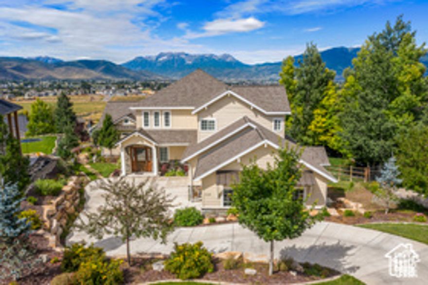 WELCOME! This exquisite custom home presents the height of detailed traditional luxury while still maintaining comfort and intimacy. Enjoy gorgeous outside living, garden boxes, room for a pool, and the allure of interior neutral walls, trim, and floor coverings: a fresh slate for your own imagination. Upon first entering this 7280 sf home with oversized 3-car garage of another 861sf, you'll discover every inspired space is well thought out; Entry Way, Formal Dining Room, Music Room or semi-formal Living Room, 2 designer gourmet Kitchens, 3 Family Rooms/Dens or GameRooms, 3 Primary Bedrooms ensuite, 4 additional Bedrooms that can also be used for an Office, Craft Room, Library...THE POSSIBILITIES ARE ENDLESS... The breathtaking views from the entire back of this home of the WASATCH BACK, the mighty MT TIMPANOGOS, and the charming HEBER/MIDWAY VALLEY are unparalled. Sunsets will knock your socks off! And you'll definitely want a telescope for Heber's world famous dark skies of moon, stars and twinkling city lights below. This home offers a SPECTACULAR NEW LIFESTYLE NOW AND IN YOUR FUTURE, (elevator included). Boating on Deer Creek Reservoir, snow sports at Deer Valley Resort, hiking, biking and playing...the majestic Heber Valley has it all. SELLER WILL PAY BUYER REQUIRED CLOSING COSTS WITH NEGOTIATED & CLOSED CONTRACT before Dec 31, 2025.  Square footage figures are provided as a courtesy estimate only and were obtained from builder. Buyer is advised to obtain an independent measurement.